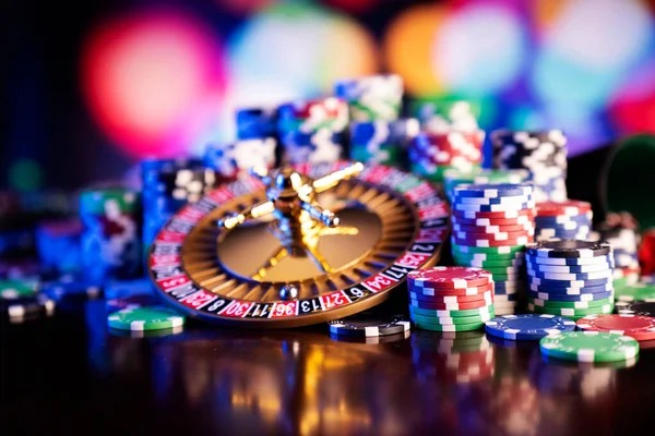 Table selection screen showing Allbet live-dealer options with stake limits and player counts
